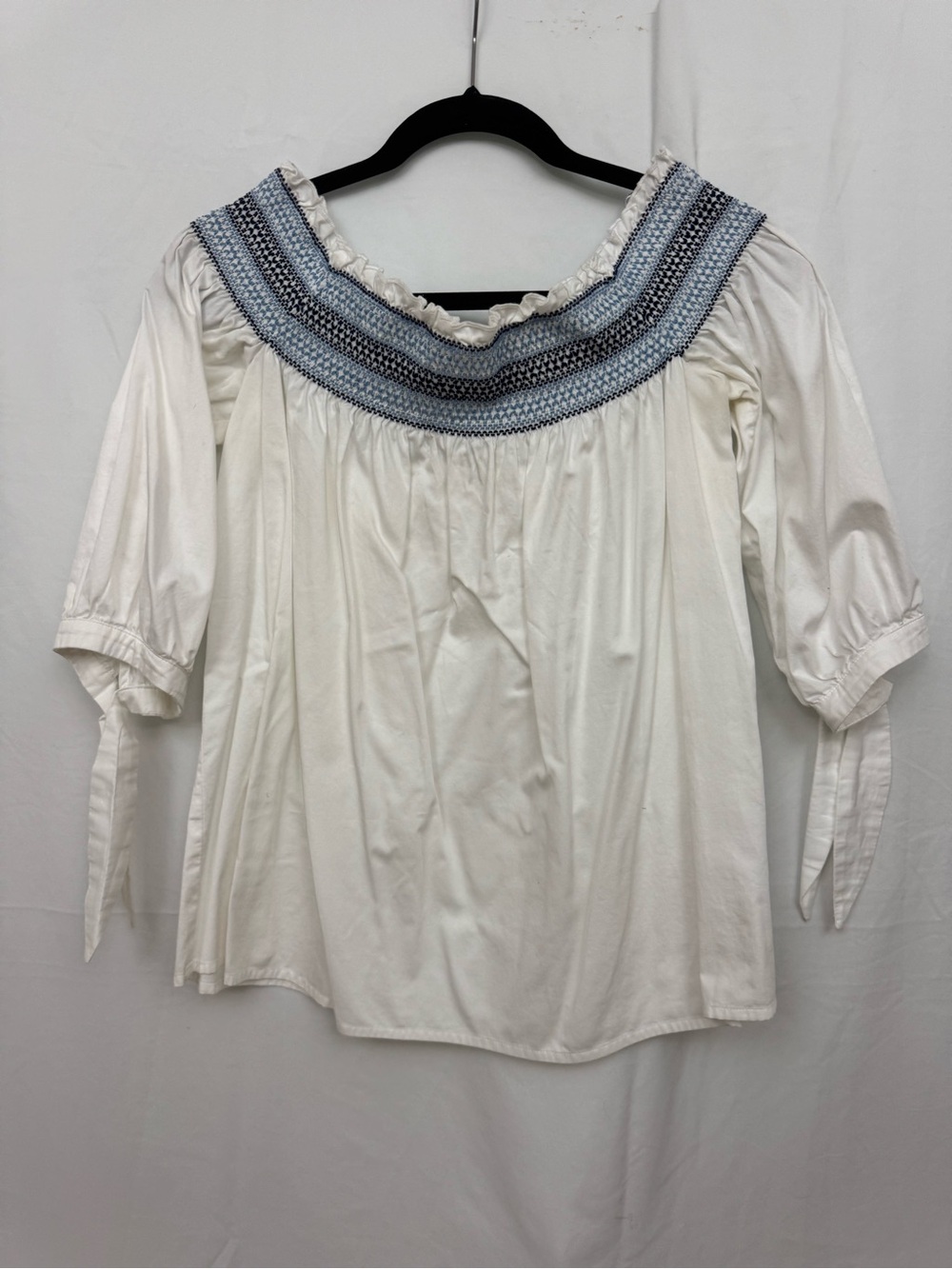 Smocked Off-Shoulder Peasant Top in White with Blue Embroidery